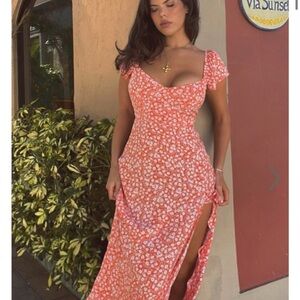 SHOWPO DONISSA MIDI DRESS - THIGH SPLIT FLUTTER SLEEVE DRESS IN ORANGE FLORAL